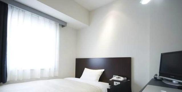 Hotel Mid In Akabane Ekimae Tokio Habitación foto